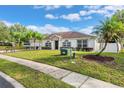 House exterior showcasing a well-maintained lawn at 1331 Island Trees Ln, Deland, FL 32720