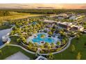 Community with resort-style pool, clubhouse, and lush green spaces at 1532 Nassau Point Trl, Kissimmee, FL 34747