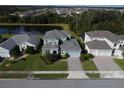 Two-story home situated in a neighborhood near a pond at 4813 Terra Sole Place, St Cloud, FL 34771