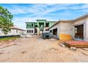 Modern house under construction on a large lot at 10345 Hart Branch Cir, Orlando, FL 32832