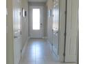 Bright and spacious hallway with tile flooring at 5430 Nw 34Th St, Ocala, FL 34482