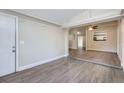Open living area with gray vinyl flooring at 524 E Church St, Deland, FL 32724