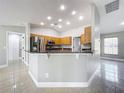Kitchen with stainless steel appliances and breakfast bar at 790 Silhouette Ct, Longwood, FL 32750