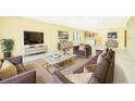 Spacious living room with contemporary furniture and an open floor plan at 514 Margaret Ln, Lake Wales, FL 33853
