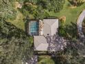 Overhead view of house showcasing roofline and pool at 33629 Wesley Rd, Eustis, FL 32736