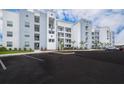 Modern apartment building with ample parking at 4721 Clock Tower Dr # 207, Kissimmee, FL 34746