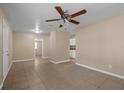 Bright living room with tile floors and ceiling fan at 626 Caliente Way, Altamonte Springs, FL 32714