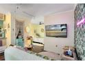 Bright and airy studio apartment with a comfy sofa and large TV at 706 E Pine St # 5, Orlando, FL 32801