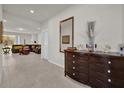 Hallway with view of living room and tile flooring at 1178 Michelangelo Ln, Winter Haven, FL 33884