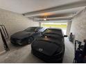 Two-car garage with ample space for cars and storage at 853 Blue Creek Dr, Haines City, FL 33844
