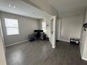Home office with desk, chair, and ample natural light at 853 Blue Creek Dr, Haines City, FL 33844