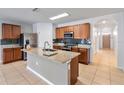 Modern kitchen with granite island and stainless steel appliances at 356 Nova Dr, Davenport, FL 33837