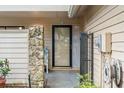 Townhome front entrance with stone accents at 358 Winchester Ct, Longwood, FL 32779