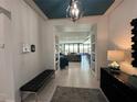 Elegant entryway with a view into a spacious living area at 331 Muirfield Loop, Reunion, FL 34747