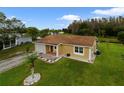 Single-story home with a large backyard at 793 E Birchwood Cir, Kissimmee, FL 34743