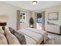 Main bedroom with ample natural light and a dresser at 303 Carleton St, Lakeland, FL 33803
