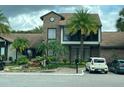 Two-story apartment building with landscaping at 4647 Cason Cove Dr # 2425, Orlando, FL 32811