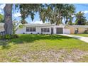 Single story home with mature landscaping at 752 Colfax Dr, Daytona Beach, FL 32114