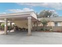 Carport and entrance to condo unit at 280 Windmeadows St, Altamonte Springs, FL 32701