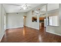 Spacious living room with hardwood floors and vaulted ceilings at 13912 Fox Meadow Dr, Orlando, FL 32826