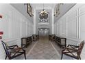 Elegant lobby with comfortable seating and high ceilings at 3356 Robert Trent Jones Dr # 101, Orlando, FL 32835