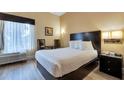 Cozy single bedroom with a comfortable bed and window at 3000 Maingate Ln # 113, Kissimmee, FL 34747