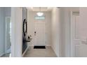Bright and spacious entryway with tile flooring at 1771 Three Bars Rd, Kissimmee, FL 34744