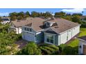 Aerial view of a single-story home with a two-car garage at 2160 Antilles Club Dr, Kissimmee, FL 34747