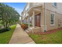 Townhome exterior with walkway at 207 Maplebrook Dr, Altamonte Springs, FL 32714