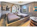 Themed bedroom with twin beds and medieval decor at 1430 Thunderbird Rd, Davenport, FL 33896