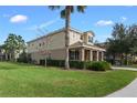 Side view of two-story house with stone accents at 4204 Oakview Dr, Davenport, FL 33837