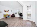 Bright office space with wood-look tile floors at 11648 Paragraph Rd, Orlando, FL 32832