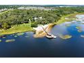 Private dock with gazebo on a calm lake at 17017 Marsh Rd, Winter Garden, FL 34787
