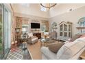 Bright living room with high ceilings and comfortable seating at 2724 Sarzana Ln, Apopka, FL 32712