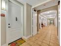 Condo entryway with tiled floors and access to hallways at 501 Mirasol Cir # 213, Celebration, FL 34747
