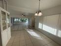 Spacious dining area with tile floors and built-in hutch at 1316 N. Amelia Avenue, Deland, FL 32724