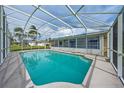 Inviting screened-in pool with backyard access at 357 Lariat Ln, Kissimmee, FL 34743