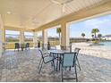 Community pool area with covered seating and tables at 4953 Kaia Ave, Winter Haven, FL 33884