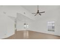 Spacious living room with high ceilings and ceiling fans at 14646 Brightwell Ct, Orlando, FL 32824