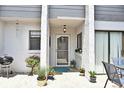 Townhouse patio with potted plants and a grill at 147 Olive Tree Circle # 147, Altamonte Springs, FL 32714