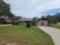 Brick ranch home with a large front yard at 5003 Shelley Ct, Lakeland, FL 33805