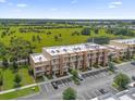 Aerial view of townhome community, showcasing location and parking at 3215 Brasilia Ave, Kissimmee, FL 34747