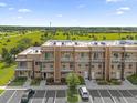 Modern townhome community, aerial view showing surrounding landscape at 3215 Brasilia Ave, Kissimmee, FL 34747