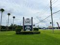 Sign for Legacy Grand Condos and nearby businesses at 5245 W Irlo Bronson Memorial Hwy # 154, Kissimmee, FL 34746