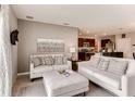 Bright and airy living room with comfortable seating and open floor plan at 3475 Sandalwood Isle Way, Ocoee, FL 34761