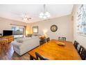 Bright dining area with wood table and access to living room at 3520 Calabria Ave # 3520, Davenport, FL 33897