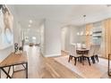 Bright dining room with hardwood floors and chandelier at 2094 Derwent Dr, Davenport, FL 33896
