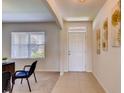 Bright entryway with tile flooring and an office space at 5112 Tana Ter, Saint Cloud, FL 34773