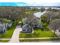 Two-story house with lake view, large backyard, and two-car garage at 6893 Hidden Glade Pl, Sanford, FL 32771