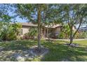 House exterior showcasing landscaping at 1562 Anorada Blvd, Kissimmee, FL 34744